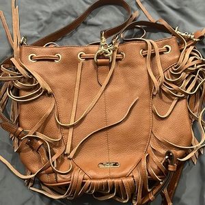 I am selling a dulce vita backpack that a purse